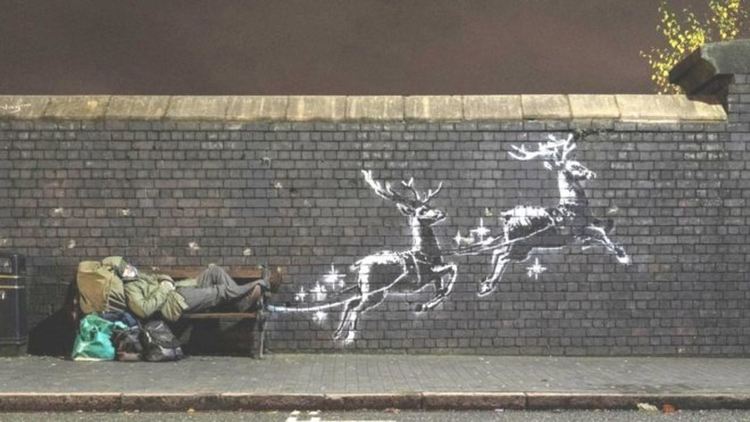 Banksy прати бездомник сред звездите с коледен впряг (видео)